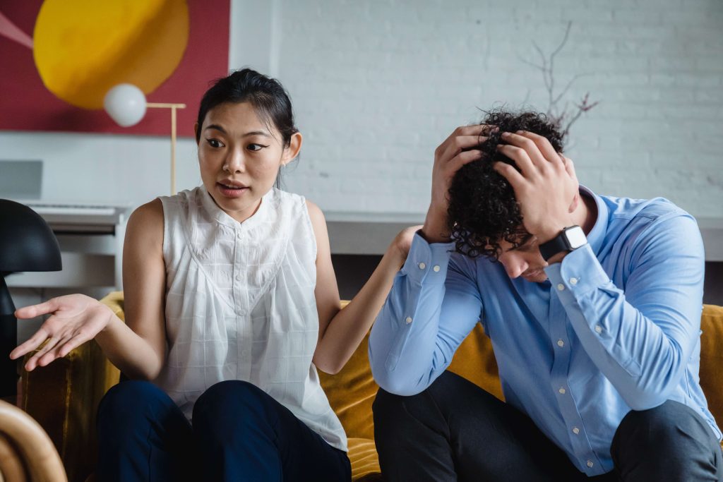 A couple works on their problems with a marriage counselor in Boca Raton, FL.